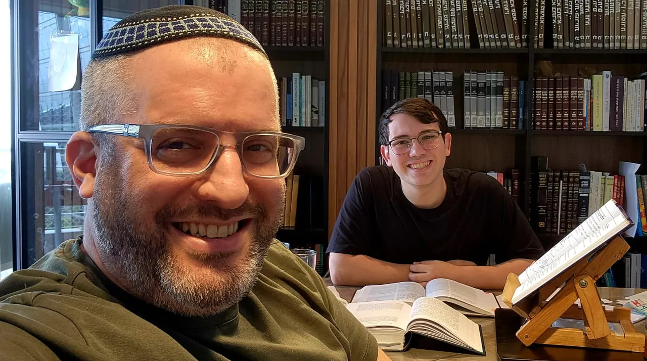 Mati with Rabbi Meir Szames in his office